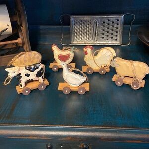 FREE w/ any purchase Six primitive wooden pull toys  each measures 3x3.